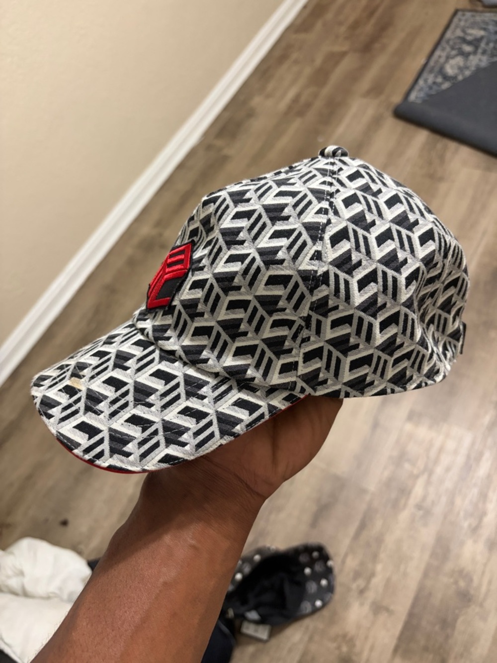 MCM Men’s Black & White Geometric Cap with Red Patch
